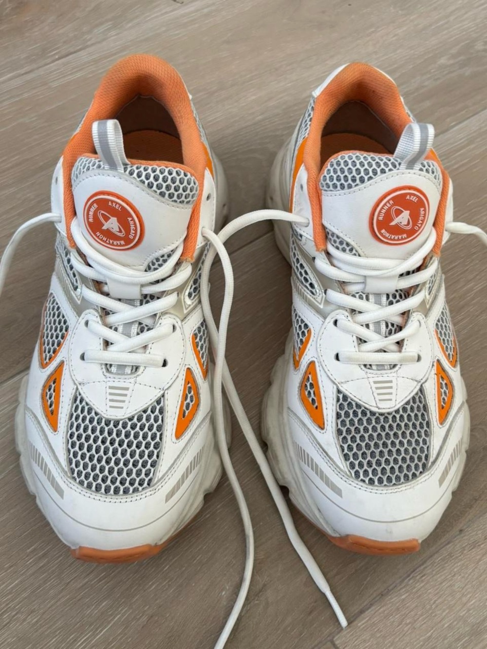 Axel Arigato White and Orange Athletic Sneakers